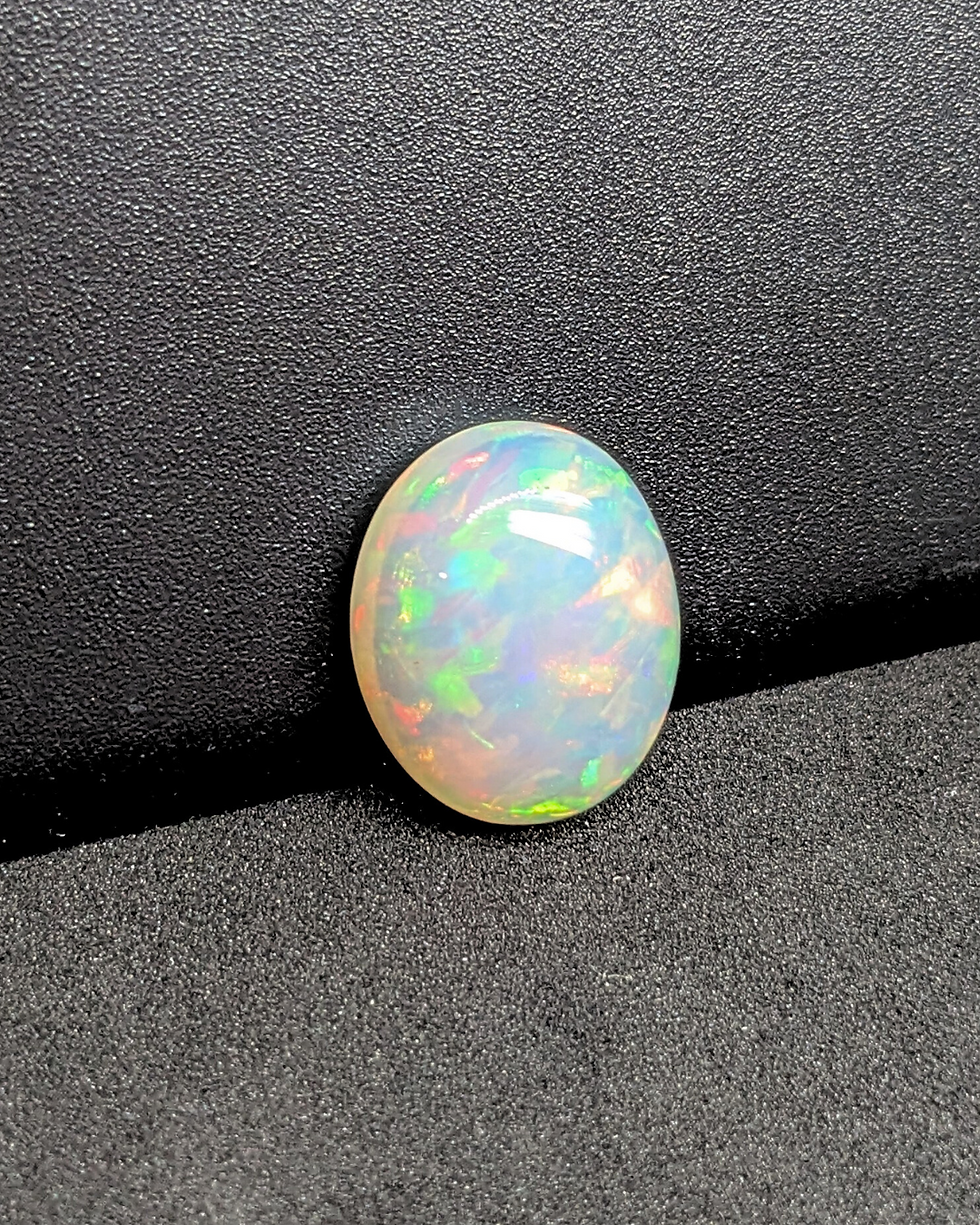 Thumbnail: AAA Ethiopian gemstone polished into oval cabochon
