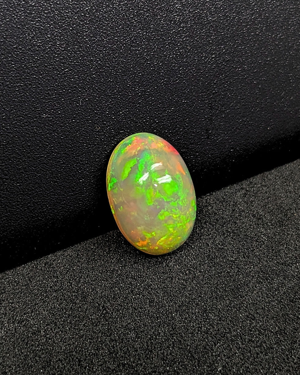 Thumbnail: Natural loose oval Ethiopian Welo opal gemstone for holiday