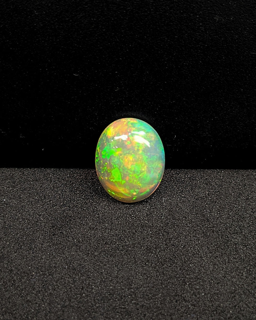 Thumbnail: AAA-quality natural Ethiopian opal cabochon with green fire