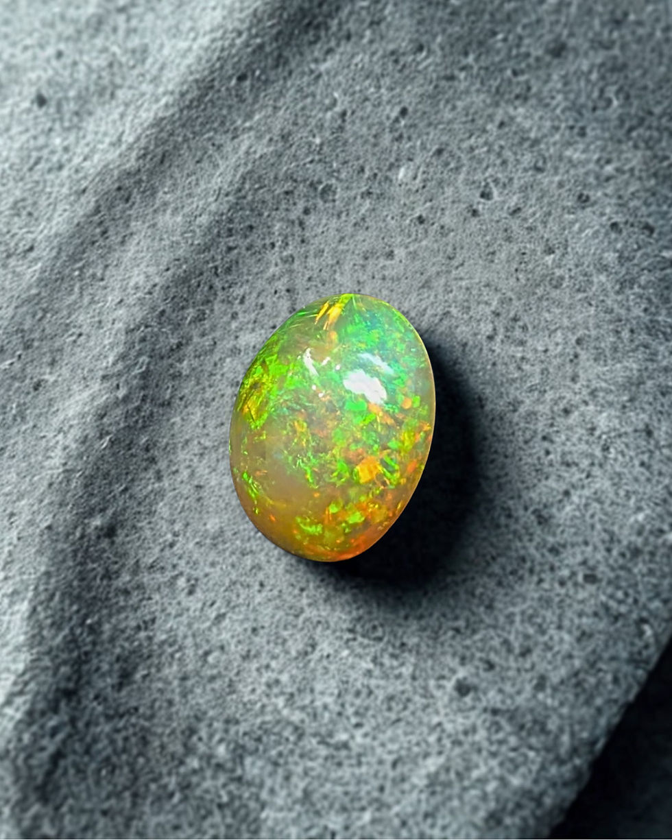 yellow rare Ethiopian opal loose gemstone oval cabochon cut