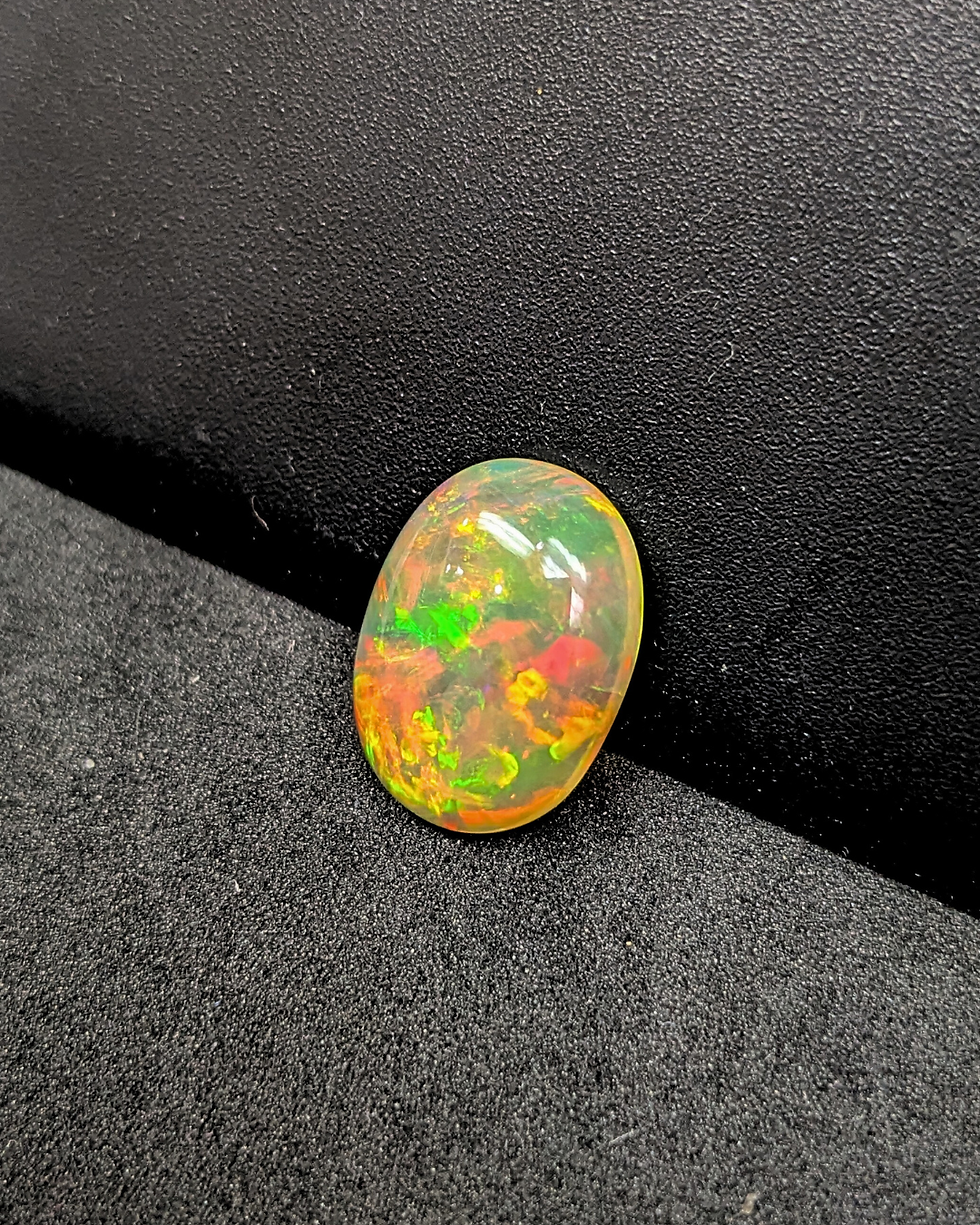 Thumbnail: Welo Ethiopian opal loose gemstone 16x12 mm cabochon