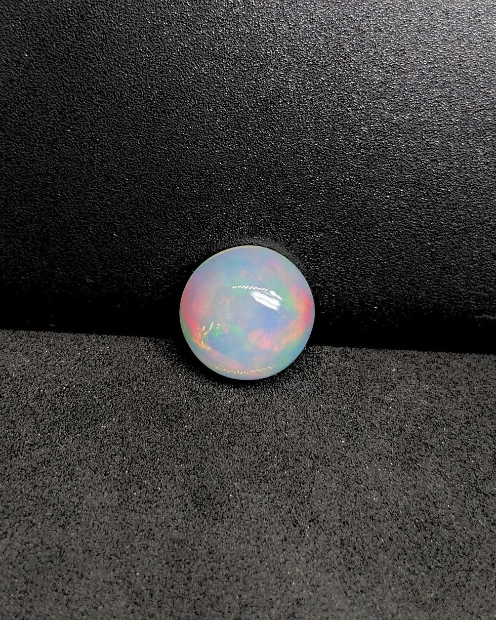 Thumbnail: Blue fire Ethiopian opal round cabochon