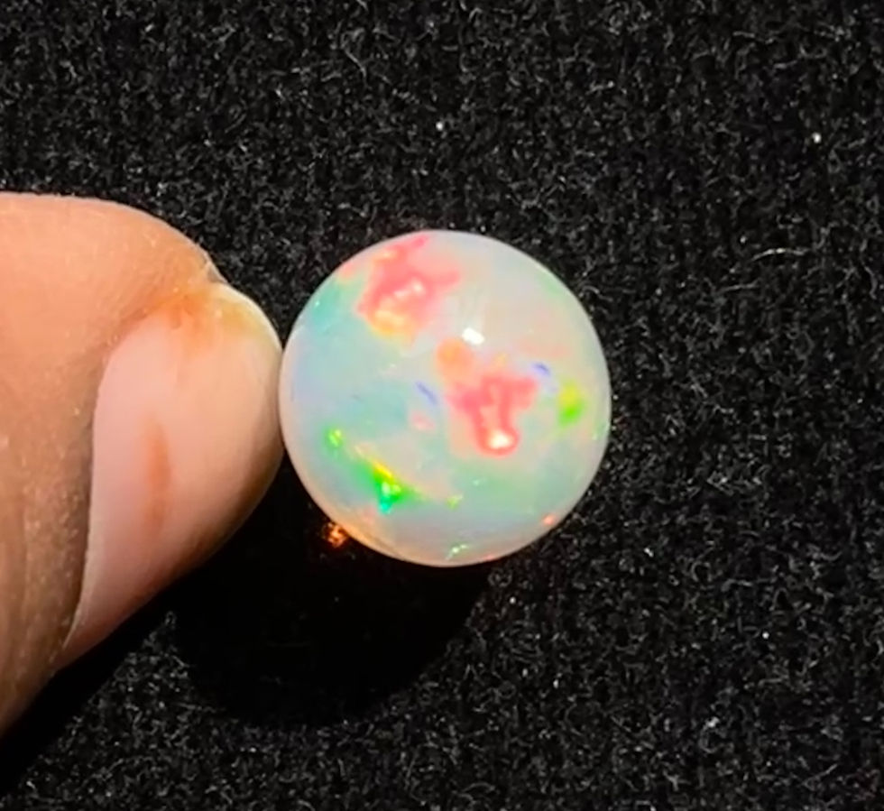 Thumbnail: Welo opal cabochon gemstone