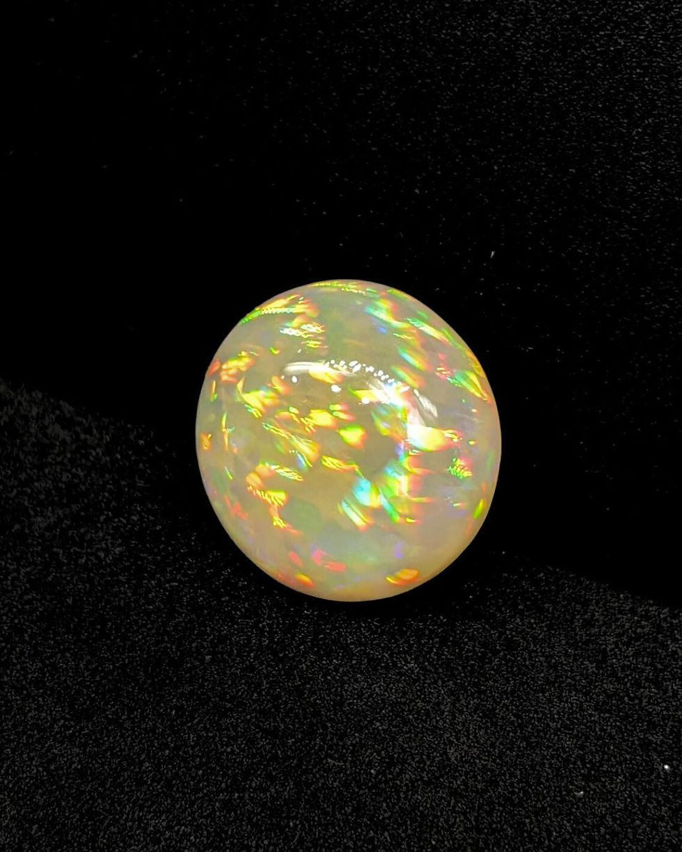 Thumbnail: cabochon opal gemstone October birthstone