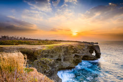 Okinawa, Japan at Manzamo Cape during sunset.