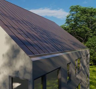 Recessed gutter detail at eave on contemporary home with standing seam metal roof