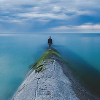 Man standing by the Ocean
