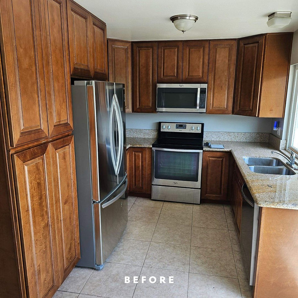 Before photo of a dark and dated kitchen with dark wood cabinets, outdated appliances, and limited natural light in a San Diego home
