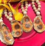 Thumbnail: Flora Inspired Ornaments, Bottle Toppers, & Napkin Rings