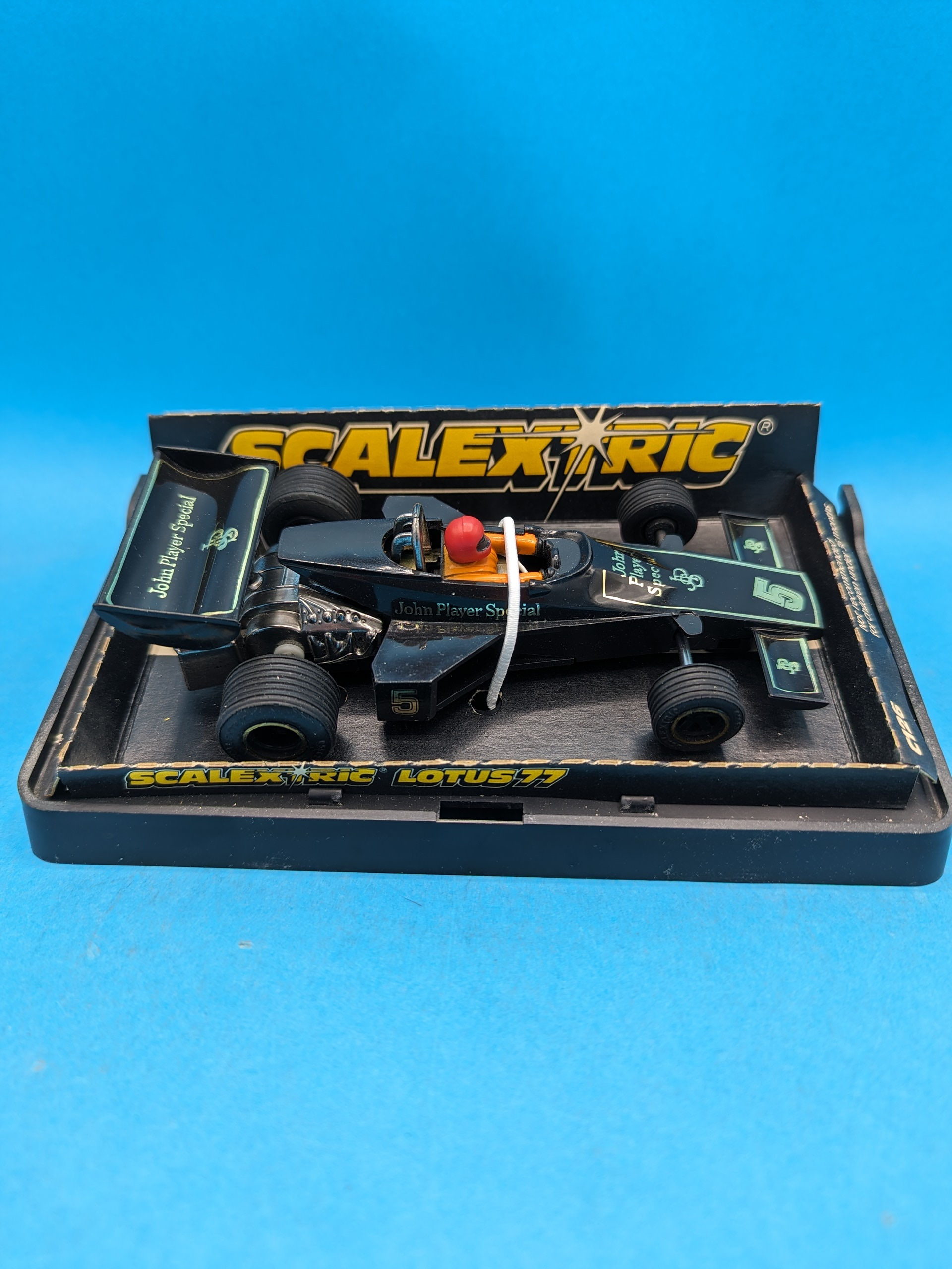 Scalextric C126 Lotus 77 with Red Helmet