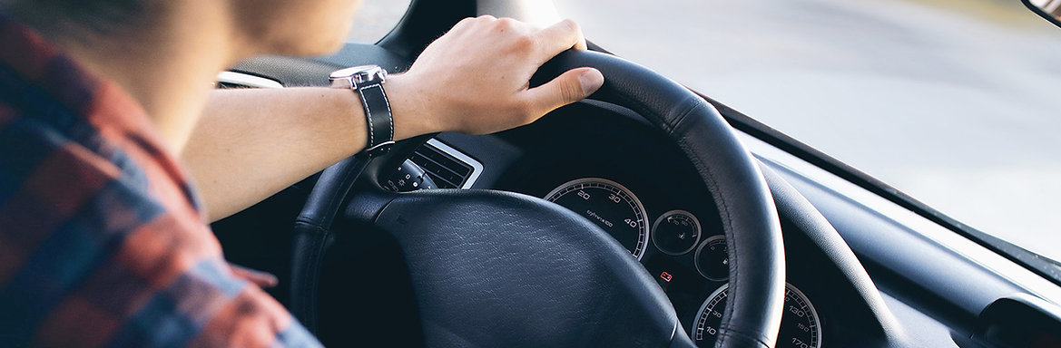 Man Driving in Car