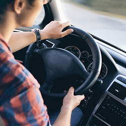 Man Driving in Car