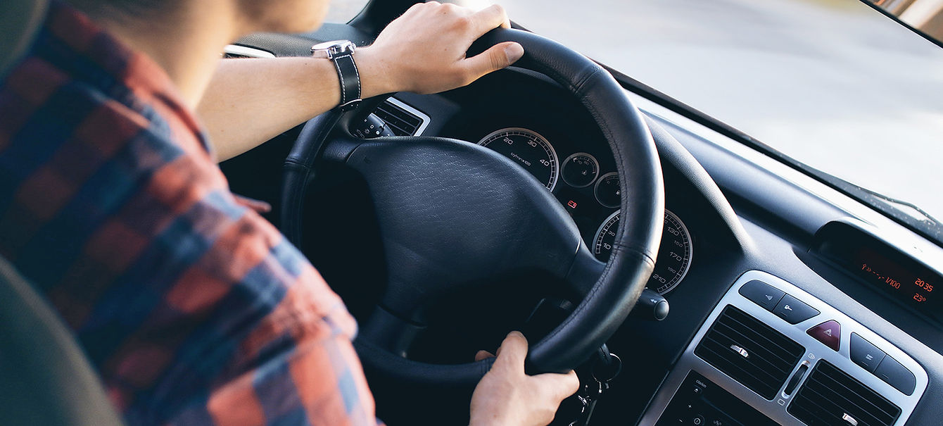 Man Driving in Car