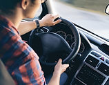 Man Driving in Car