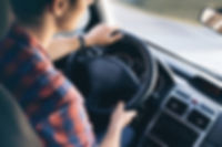 Man Driving in Car