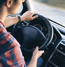 Man Driving in Car
