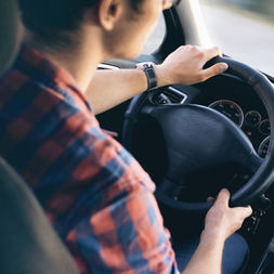 Man Driving in Car