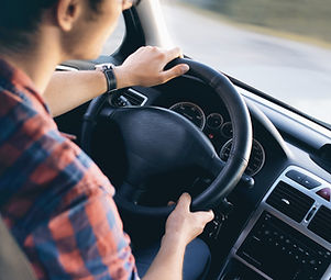 Man Driving in Car