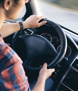 Man Driving in Car