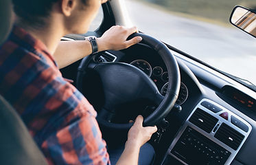 Man Driving in Car
