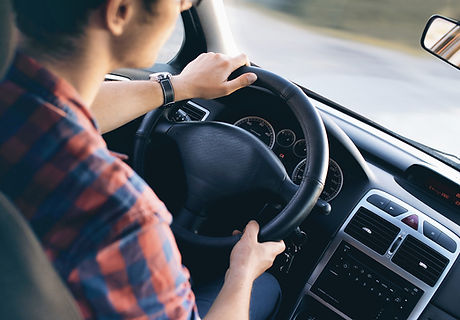 Man Driving in Car