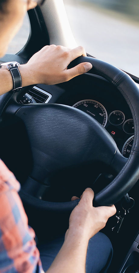 Man Driving in Car