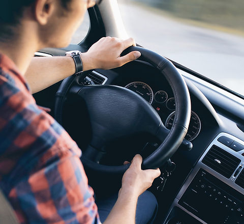 Man Driving in Car