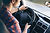 Man Driving in Car