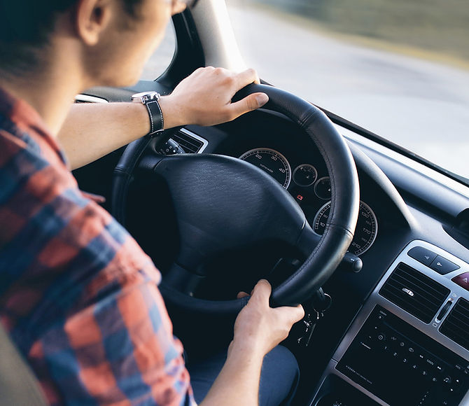 Man Driving in Car