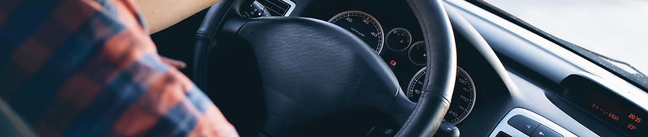 Man Driving in Car