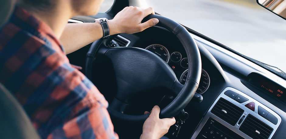 Man Driving in Car