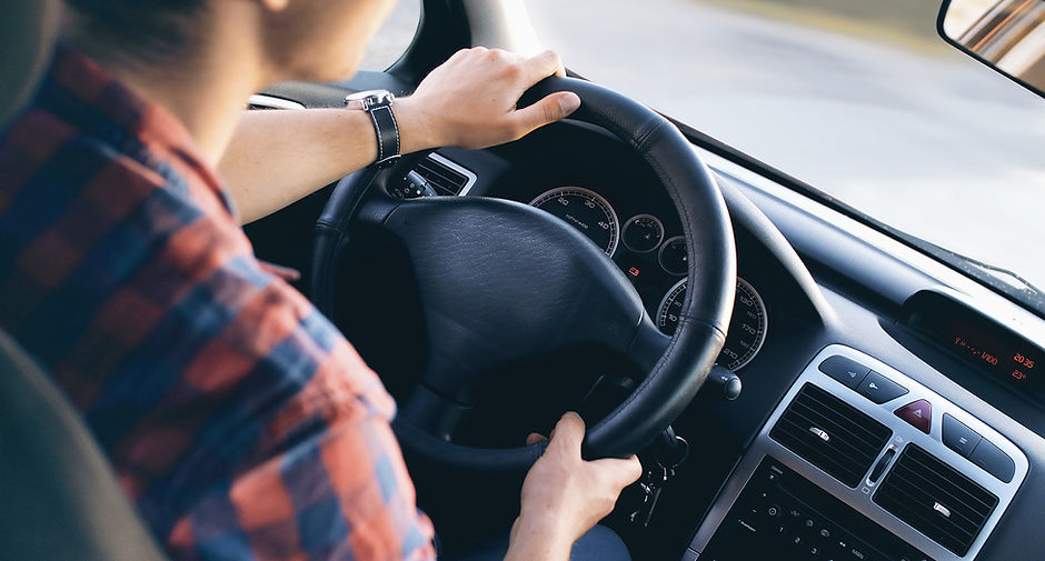 Man Driving in Car