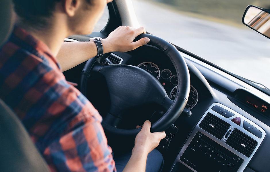 Man Driving in Car