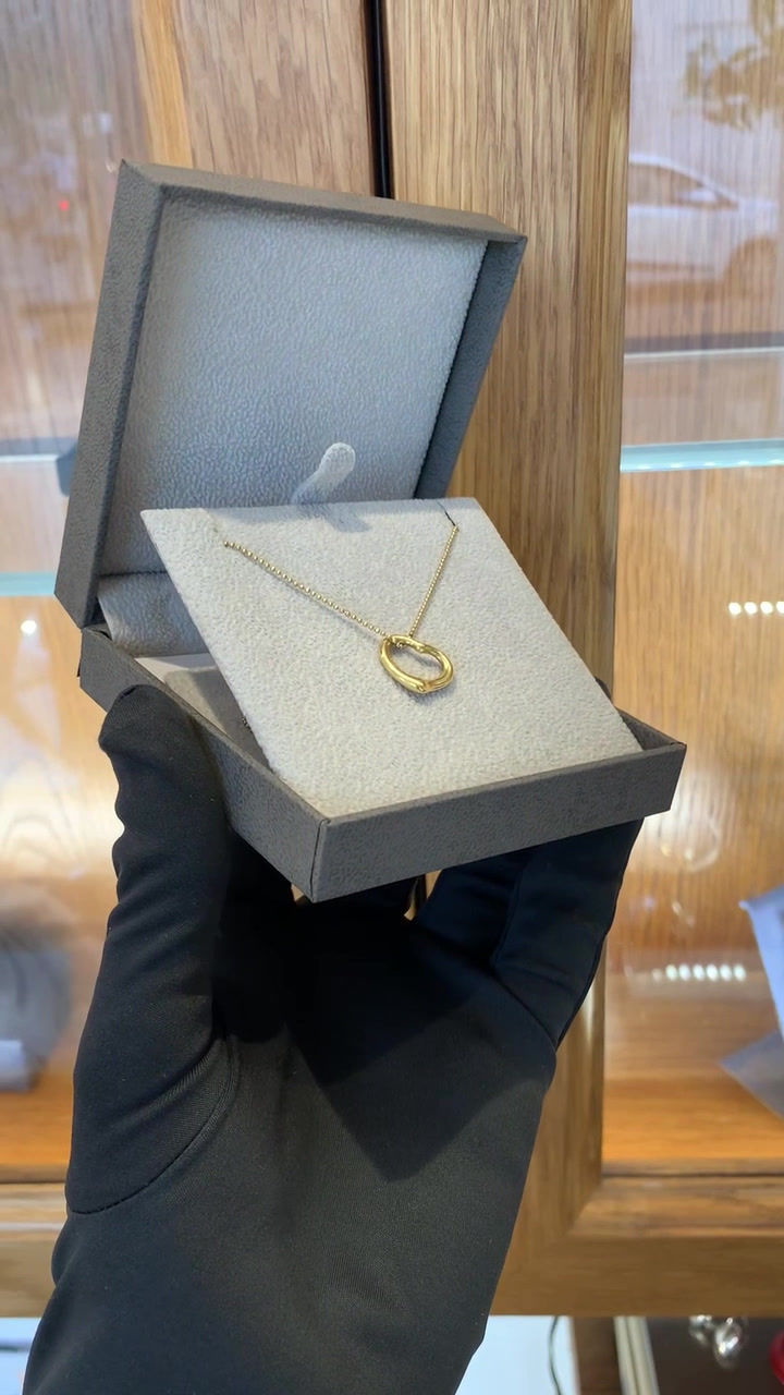 Thumbnail: Tiffany & Co. 18k Gold Open Heart Pendant Necklace