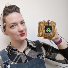 Me holding the mini hay bale, 2020