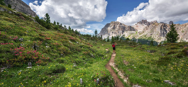 Male hiker in the Dolomites mountains_ed