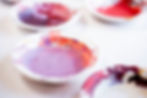 Laura Adai 4 bowls of paint.jpg