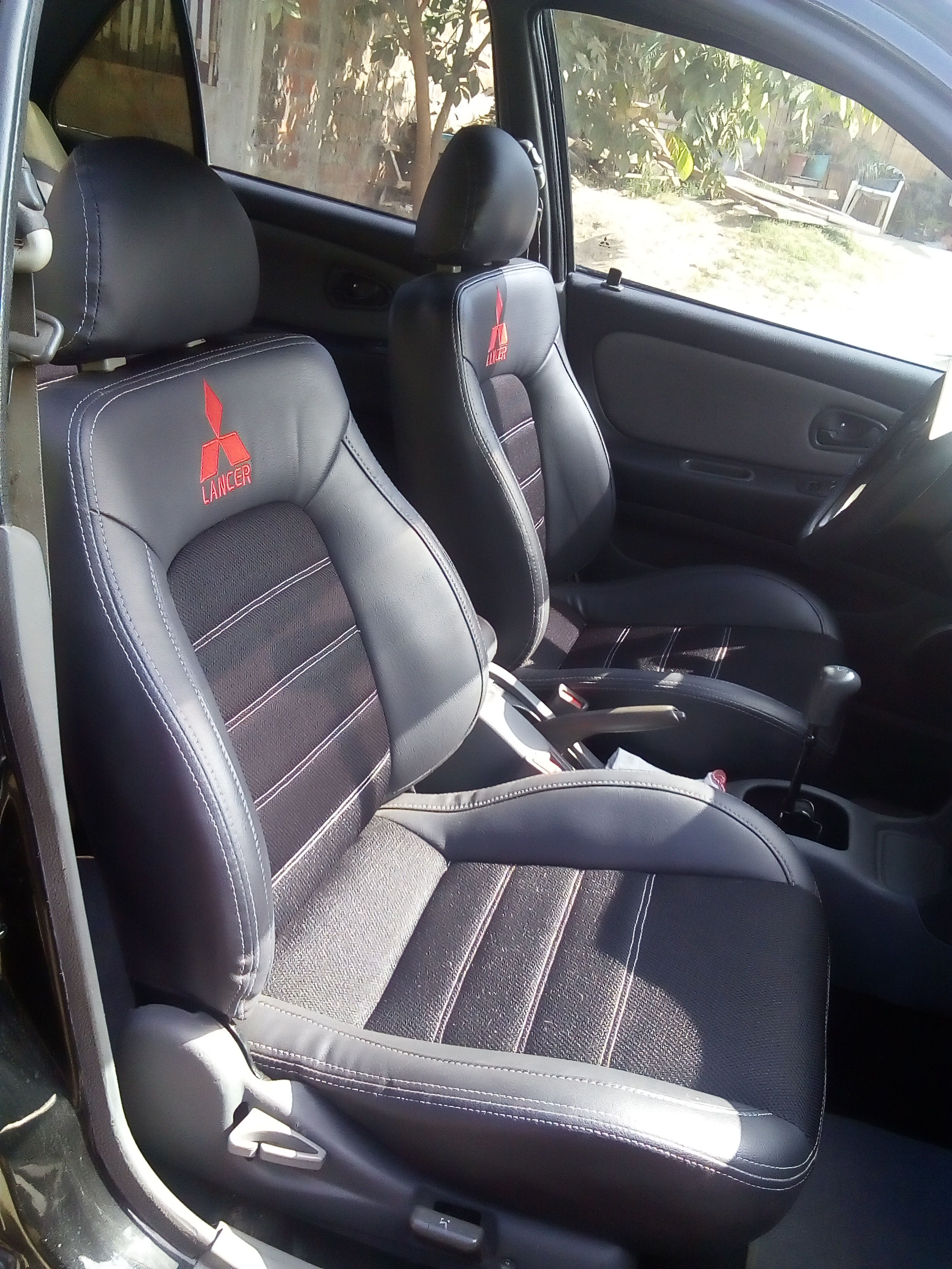 TRANSFORMACION DE ACIENTOS DE MIDSUBISI LANCER