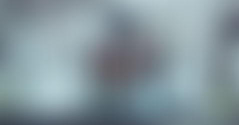 Business team walking up stairs and talking to each other during their office break.