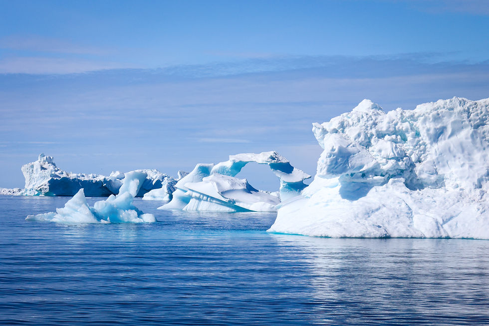 Picture 11. As the icebergs melt in the sea they form unique shapes and often roll and turn. Like a snowflake, you can't ever look at the same iceberg twice. 