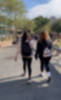 Two sisters walking in Cars Land Disneyland.