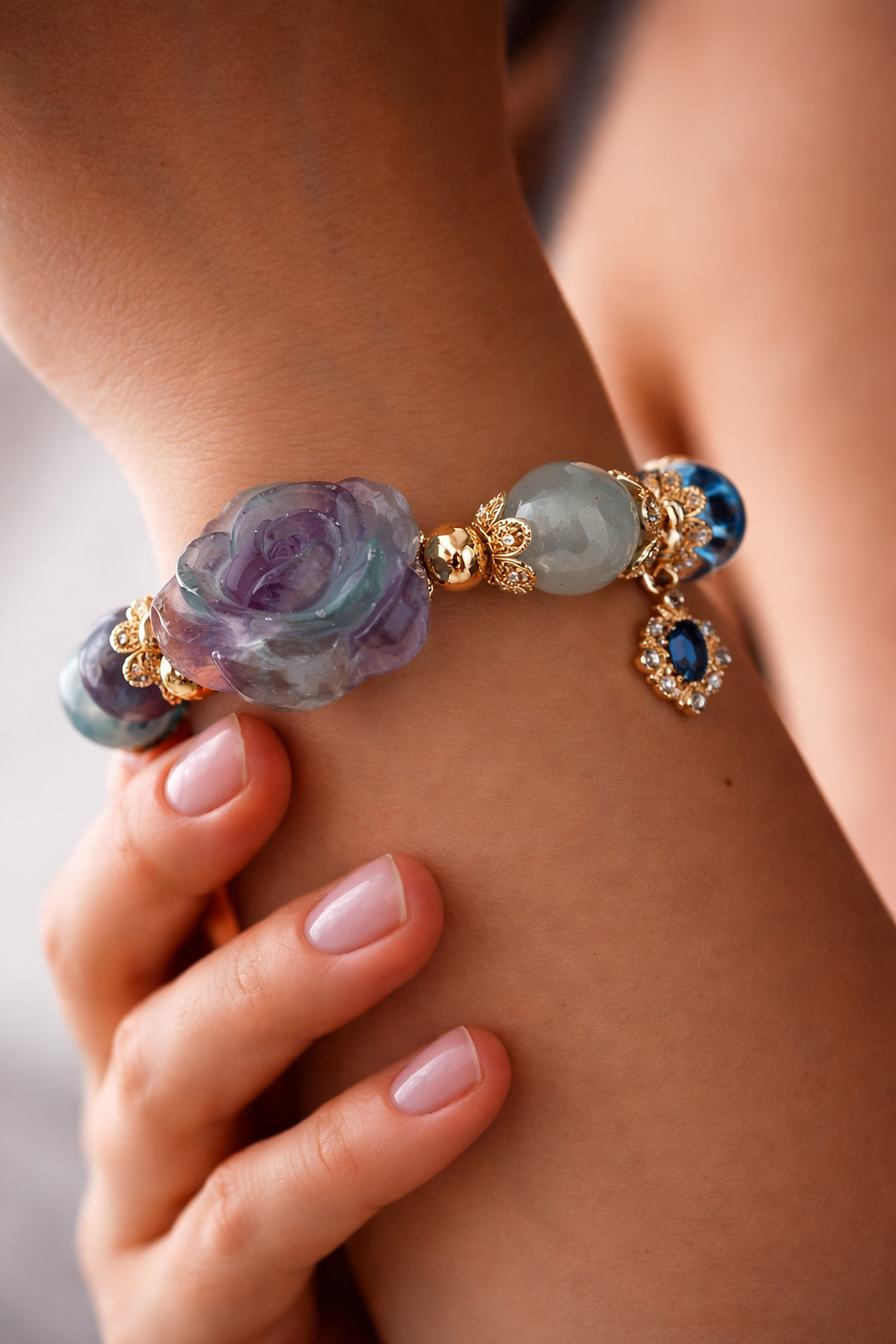 crystal bracelet on hand.png