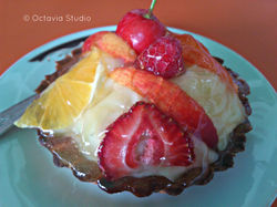 Dessert with fruit and cream