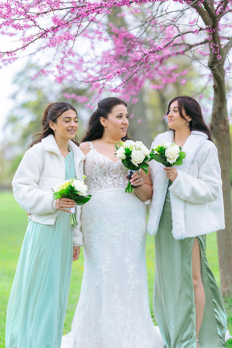 Spring wedding photography at Willistead Manor in Windsor, Ontario with cherry blossom trees