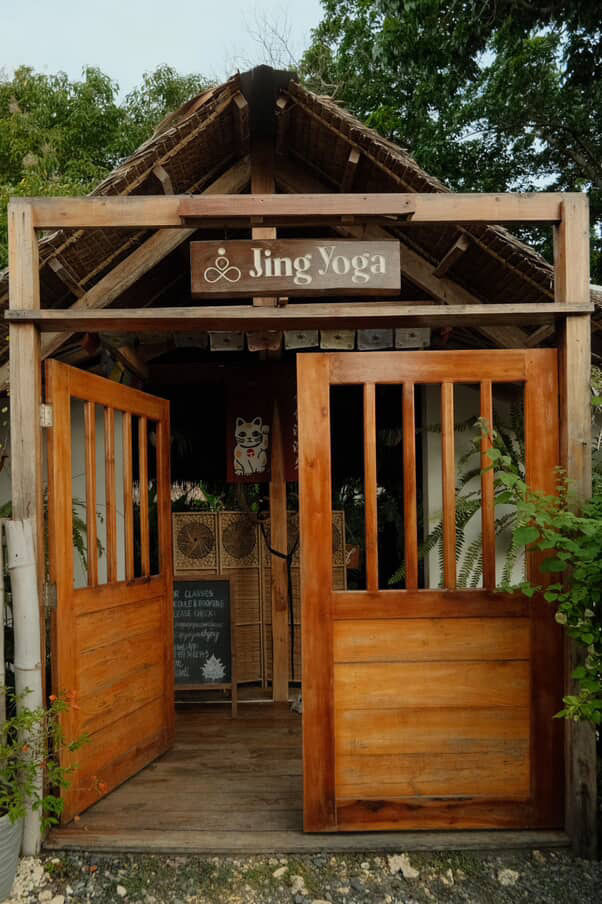 Close-up view of a yoga mat and props ready for a class