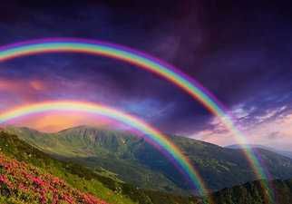 Double arc-en-ciel montagne