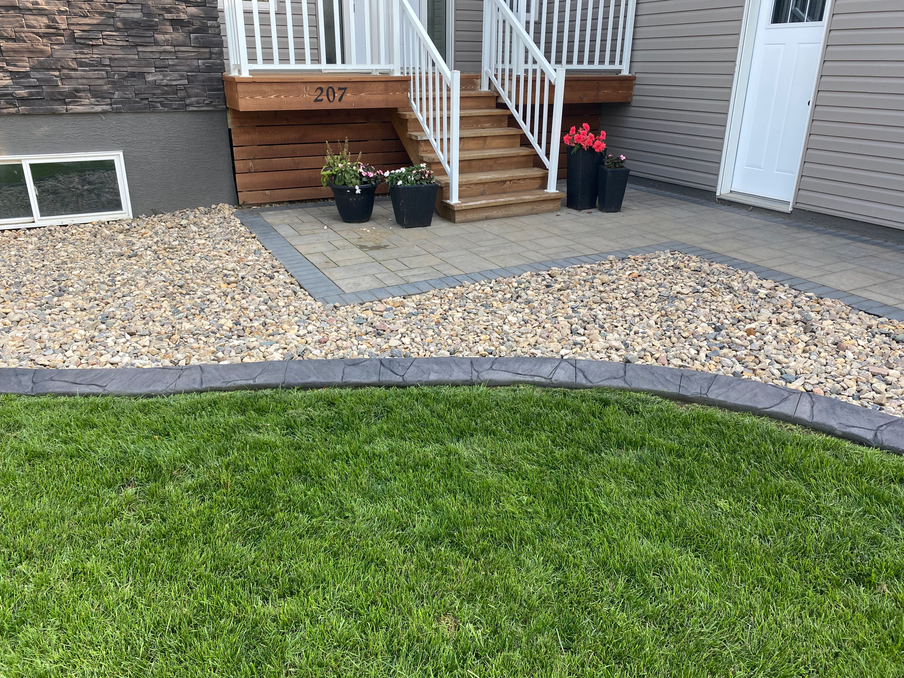 Concrete landscape curbing and edging installed in Martensville