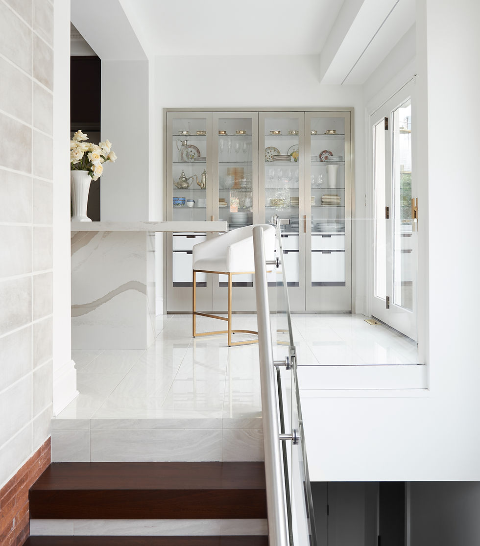 Modern white hallway with wood stairs and glass doors