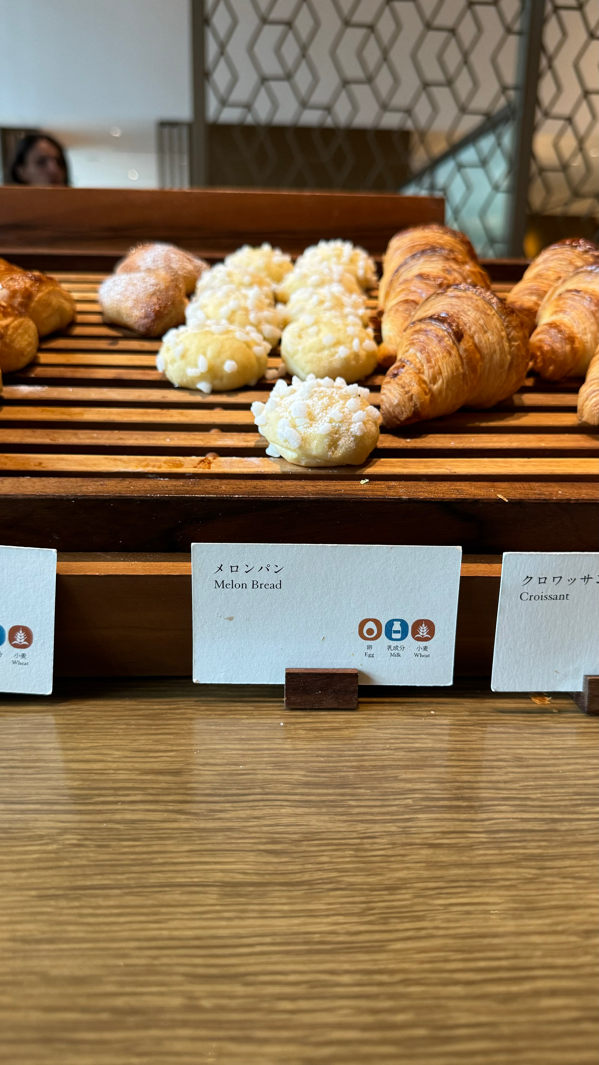 buffet spread with various pastries and melon bread