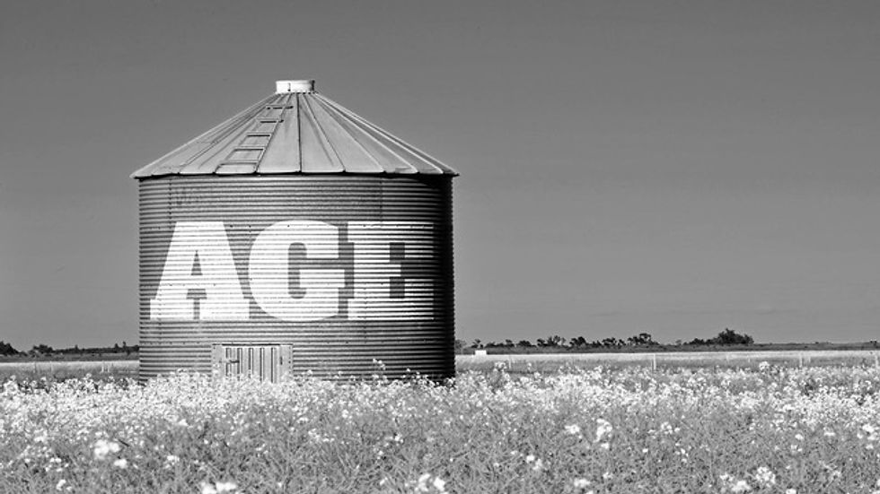 Picture of a grain silo with the word AGE written on it
